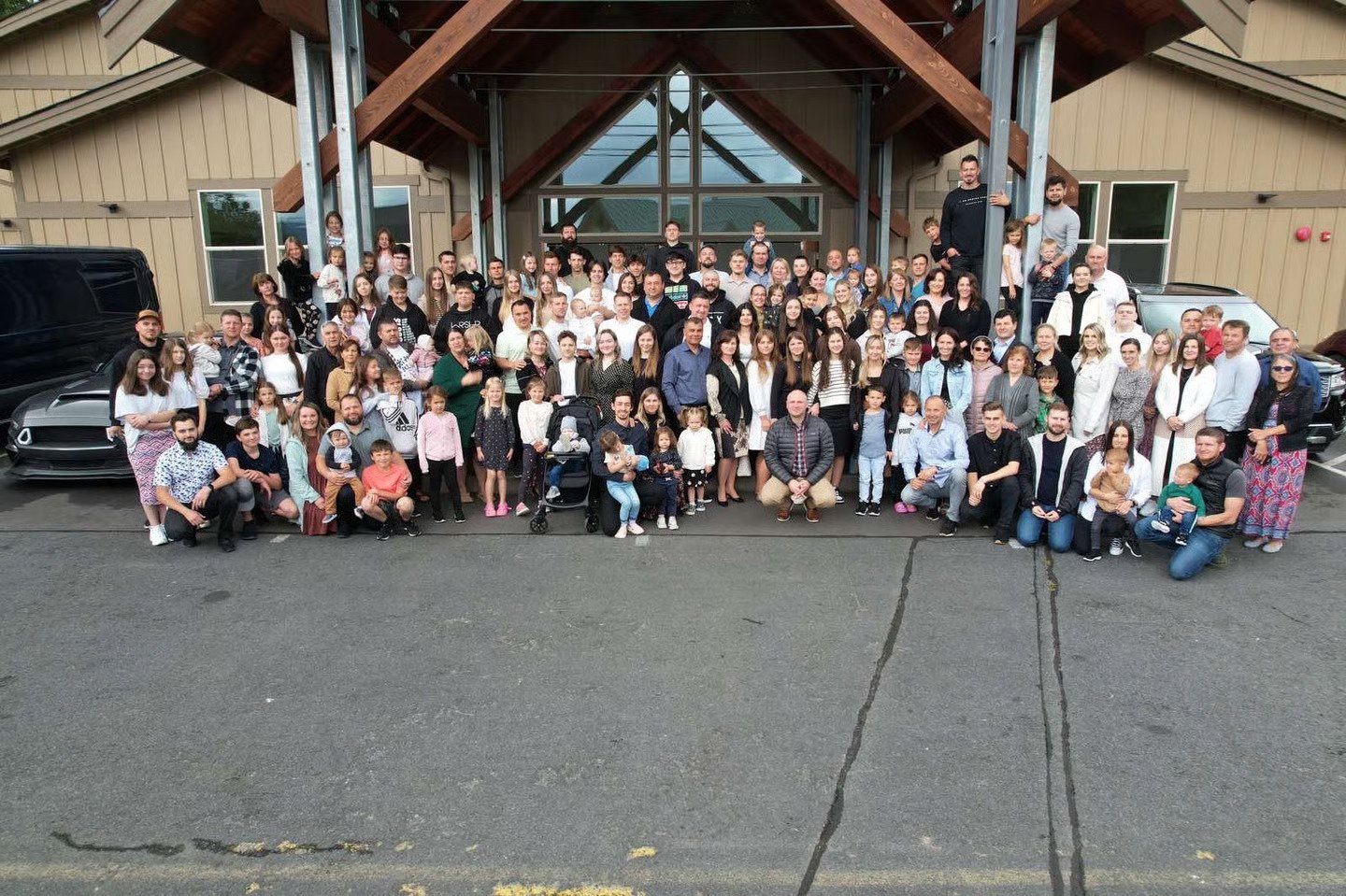 Light to the World Church family gathered outside the church building